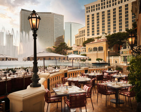 Carbone Riviera outdoor dining with NEOZ Victoria cordless table lamp