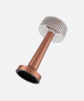 NEOZ Cooee 4 cordless lamp body in Lacquered Copper finish with ribbed clear diffuser.
