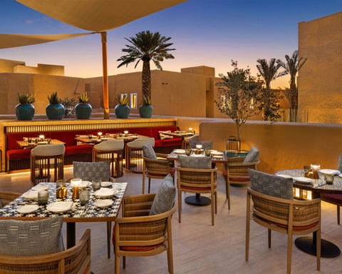 Alfresco dining with NEOZ Piccolo Portable Lamp at Taleed by Michael Mina 